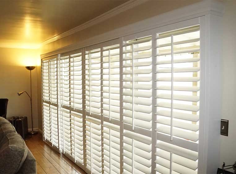 Wall of windows with shutters